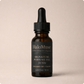 HaloMuse perfume oil for her bottle on a beige background